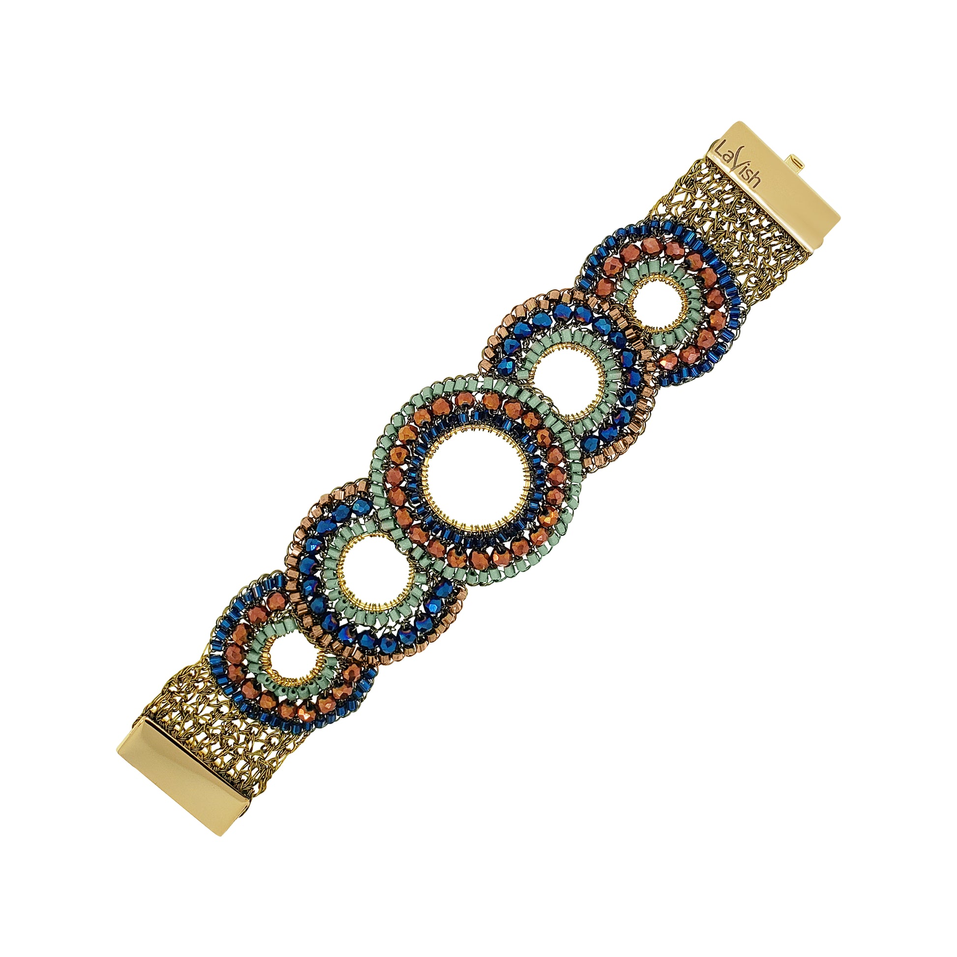 A gold-tone bracelet with a series of interlocking circular links adorned with blue, green, and orange rhinestones, shown on a plain white background. Discover the Riviera Mix Gush Bracelet, hand-crocheted in Brazil with 18K gold-filled wire, colorful crystals and an elegant circular design.