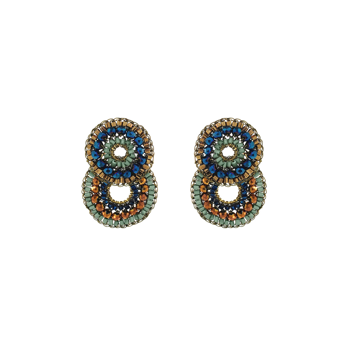A pair of handmade beaded earrings with a double-stacked circular design. The earrings feature concentric rings of metallic gold, light green, dark blue, and copper-brown seed beads, with a central open space. Shop Riviera Mix Gush Small Earrings, hand-crocheted in Brazil with 18K gold-filled wire and sparkling blue, sage and bronze crystals.