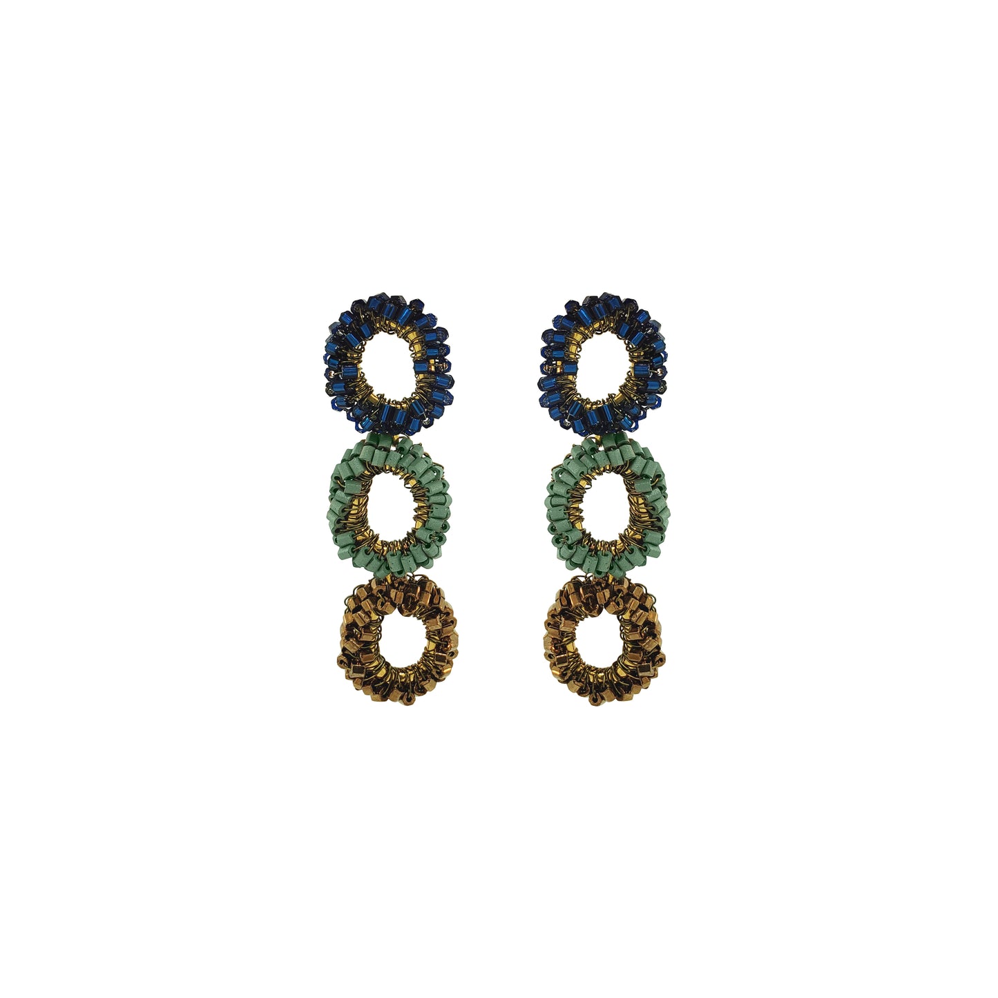 A pair of beaded drop earrings with three stacked circular rings in navy blue, sage green, and gold-tone metal on a plain white background. Shop Riviera Mix Halo Earrings, handcrafted in Brazil with 18K gold filled wire and shimmering crystals. Lightweight, colorful statement earrings.