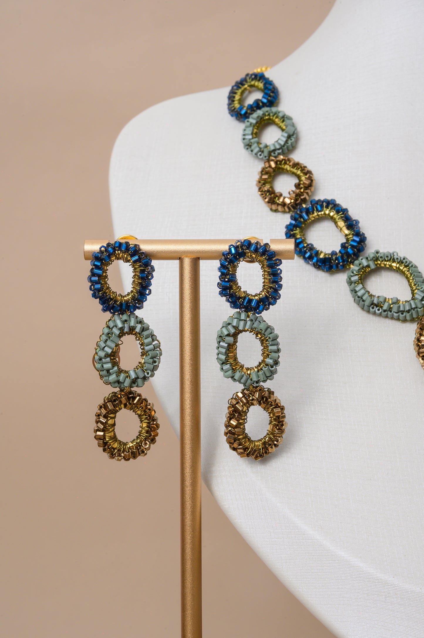 Shop Riviera Mix Halo Earrings, handcrafted in Brazil with 18K gold filled wire and shimmering crystals. Lightweight, colorful statement earrings.