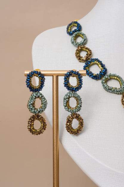 Shop Riviera Mix Halo Earrings, handcrafted in Brazil with 18K gold filled wire and shimmering crystals. Lightweight, colorful statement earrings.