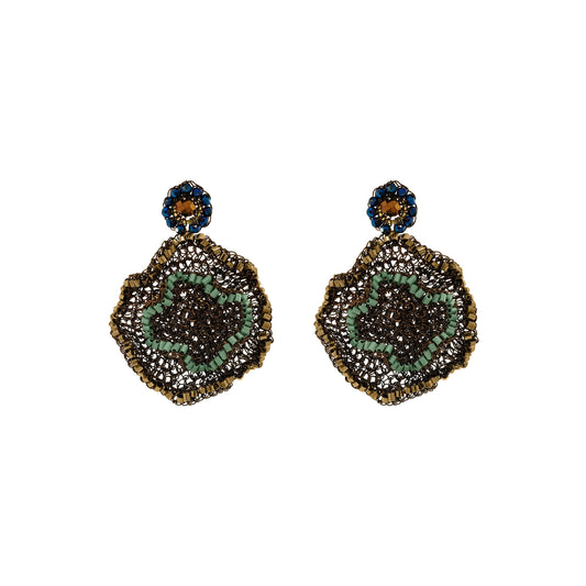 Pair of gold earrings on a white background. Riviera Mix Jasmine handmade crochet earrings featuring sculptural floral drops in gold, soft green and deep blue with sparkling crystal accents.