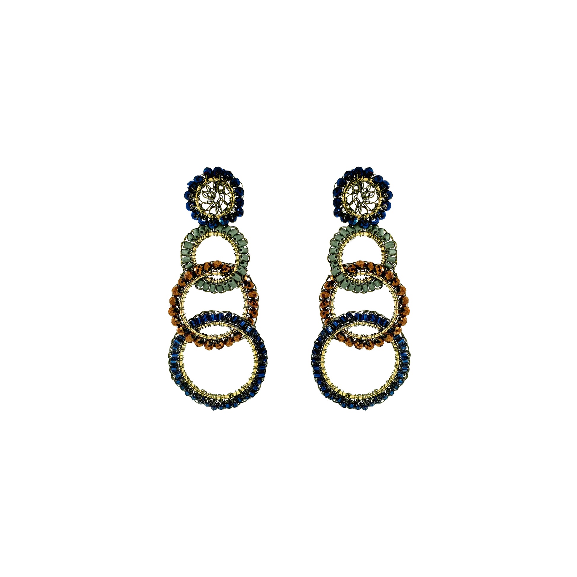 A pair of statement drop earrings featuring stacked interlocking rings in navy blue, emerald green, and gold, with a floral stud top, shown on a plain white background. Shop Riviera Mix Olympia Earrings, handcrafted in Brazil with 18K gold filled wire and colorful crystal-accented links. Lightweight, bold and unique.