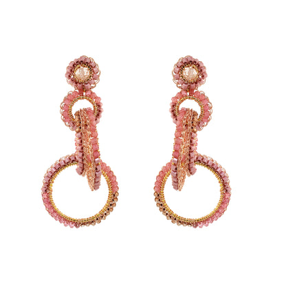 Pair of pink and gold earrings on a white background. Interlocked link hand-crocheted earrings handmade in Brazil with 18 karat rose gold filled wire, soft rose quartz beads, sparkling crystal accents, and layered circular links.