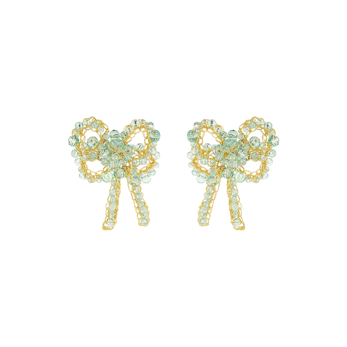 A pair of gold bow-shaped stud earrings embellished with light green faceted rhinestones, shown on a plain white background. Shop Seafoam Bow Blossom Drop Earrings. Handmade in Brazil with seafoam blue crystals and 18K gold-filled wire. Lightweight, feminine, and elegant.