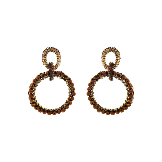 Pair of circular earrings with brown gemstones on a white background. Shop handcrafted double circle earrings featuring 18K gold-filled and enameled copper wire with sparkling crystals. Lightweight, hypoallergenic and handmade in Brazil.
