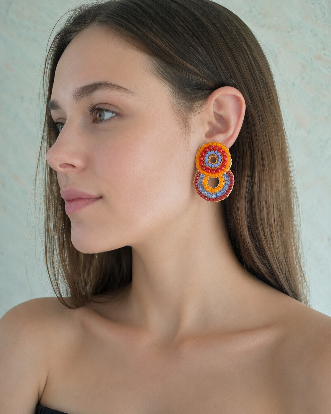 Multicolor hand-crocheted double-circle cascade earrings with sparkling crystals and glass beads, handmade in Brazil with enameled copper wire.