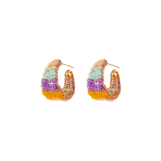 Vibrant handmade crochet hoop earrings with enameled wire and crystals, handcrafted in Brazil by skilled artisans.