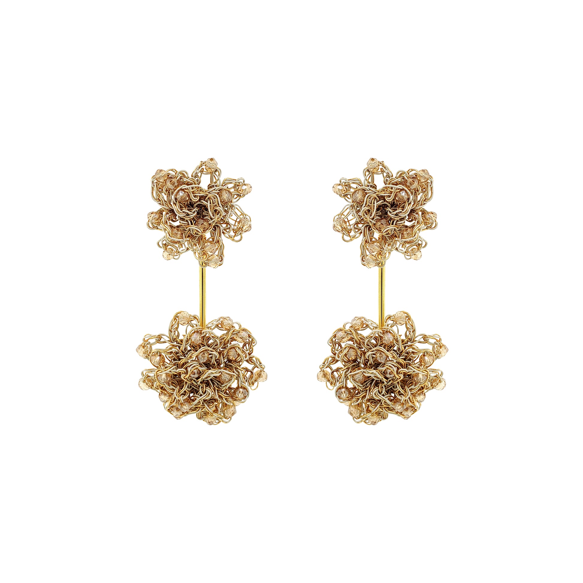 Pair of gold floral earrings on a white background. Hand-crocheted gold double mandala earrings with amber bead accents, handmade in Brazil with 18 karat gold filled wire.