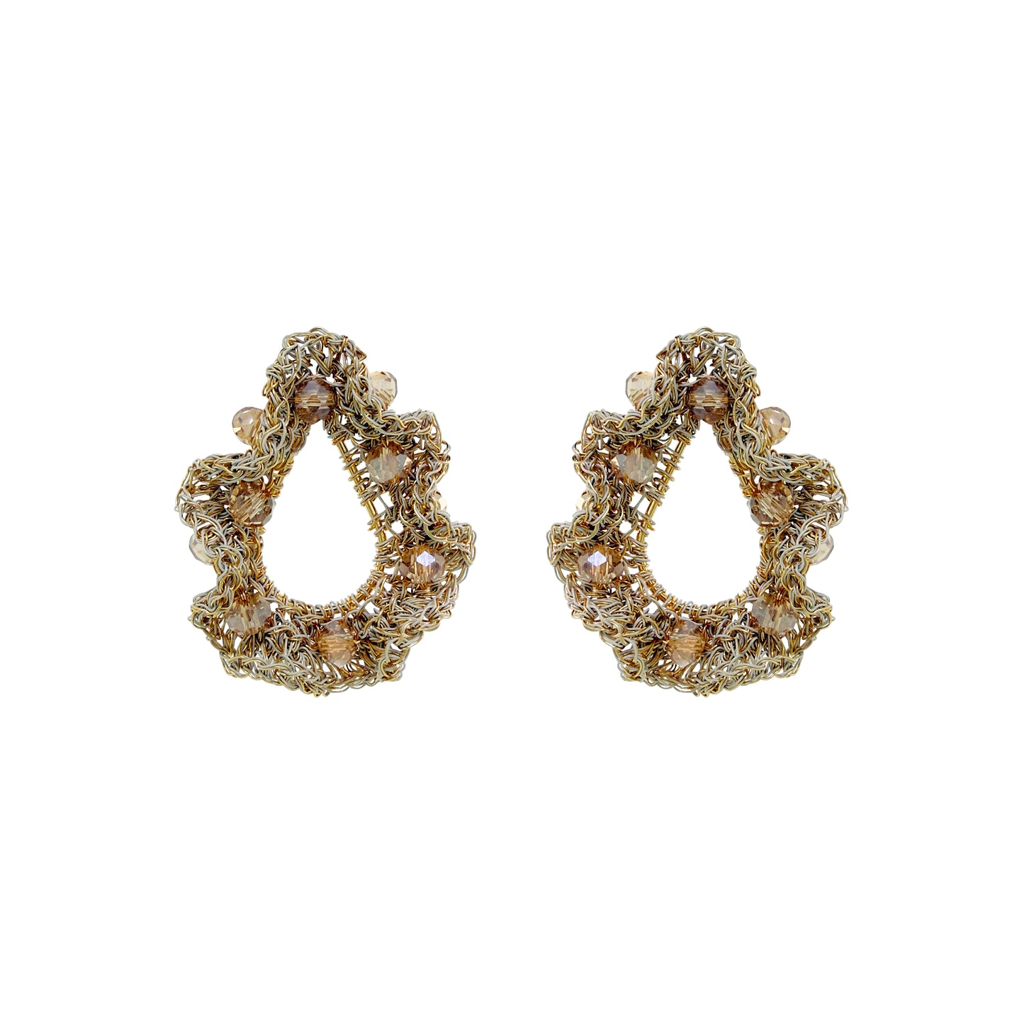 A pair of gold-toned teardrop-shaped earrings with intricate beadwork, sequins, and clear rhinestone accents, displayed on a solid white background. Nalu Teardrop hand-crocheted gold earrings with sculptural ruffled wirework and champagne crystal accents, handmade in Brazil.