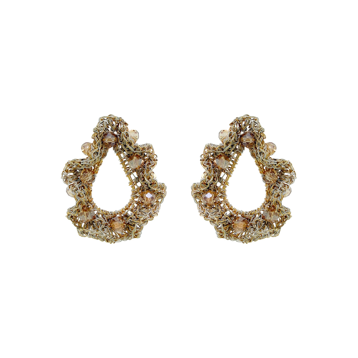 A pair of gold-toned teardrop-shaped earrings with intricate beadwork, sequins, and clear rhinestone accents, displayed on a solid white background. Nalu Teardrop hand-crocheted gold earrings with sculptural ruffled wirework and champagne crystal accents, handmade in Brazil.