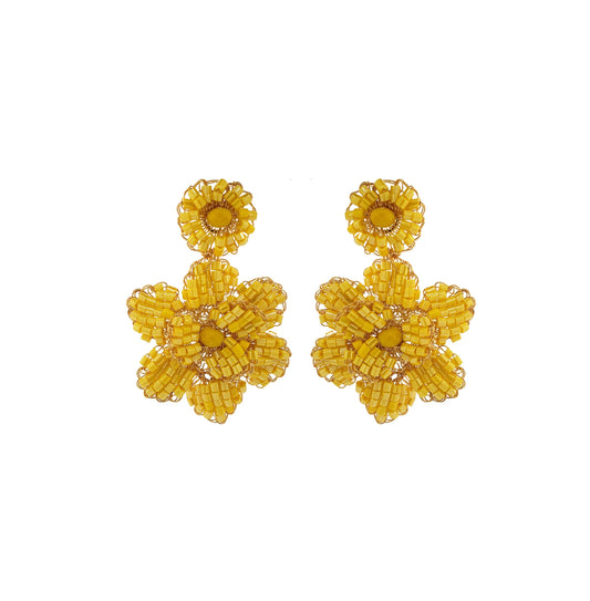A pair of hand-crocheted yellow floral earrings made with 18 karat gold filled wire. Mini floral hand-crocheted dangle earrings handmade in Brazil with 18 karat gold filled wire and warm golden-yellow bead accents.